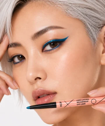 Close-up beauty look featuring cobalt blue Color Flash Liner applied along the upper and lower lash lines