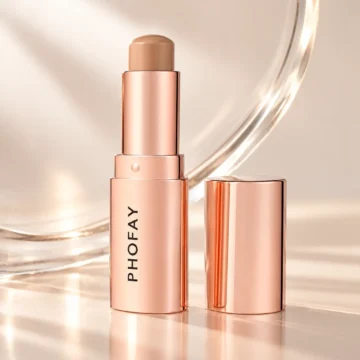 Sculpted Glow Contour cream contour stick with rose-gold packaging and warm brown contour shade