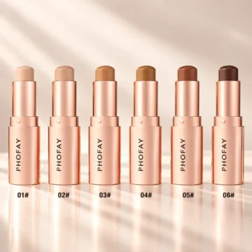 Sculpted Glow Contour cream contour sticks in six shades arranged in a row with rose-gold packaging